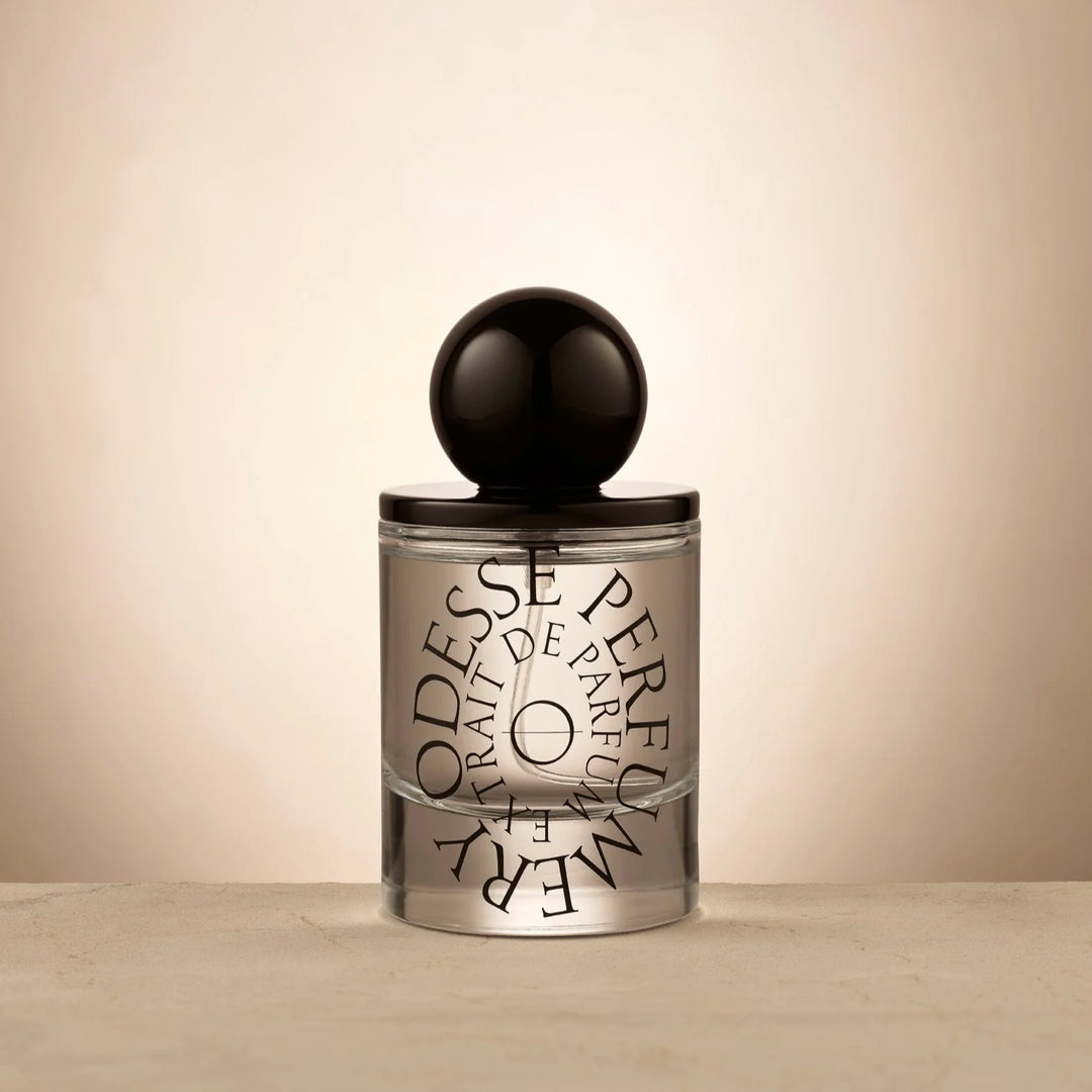 Iconic Odesse perfume, with its distinctive black orb lid, an embodiment of chic, portable fragrance in Australia.