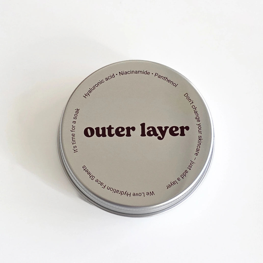 Sheet mask pack container labeled 'outer layer' on a white background