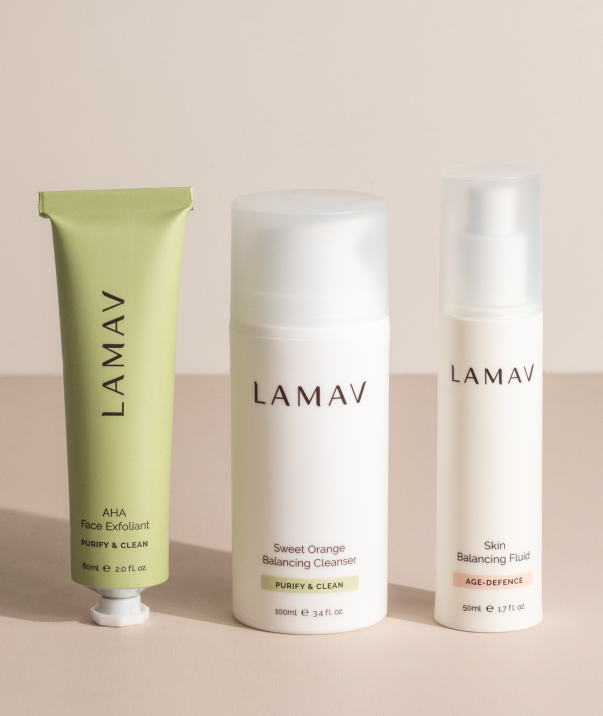 Three LAMAV skincare products on a beige background