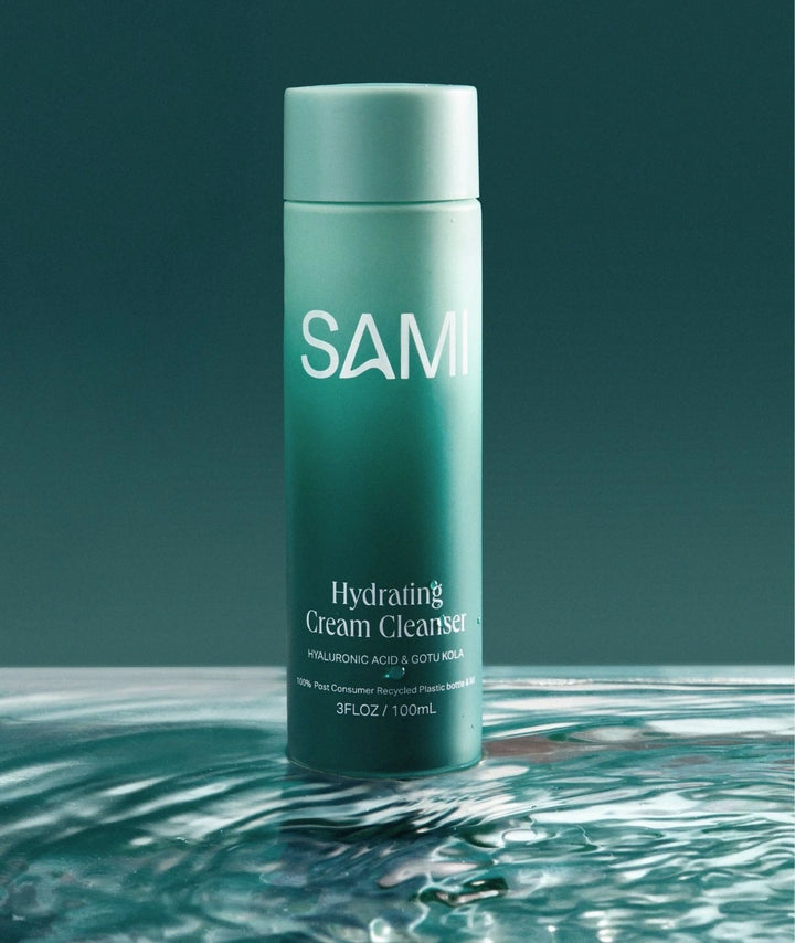 Hydrating Cream Cleanser by SAMI — green bottle standing in rippling water | Deeply hydrates and refreshes your face