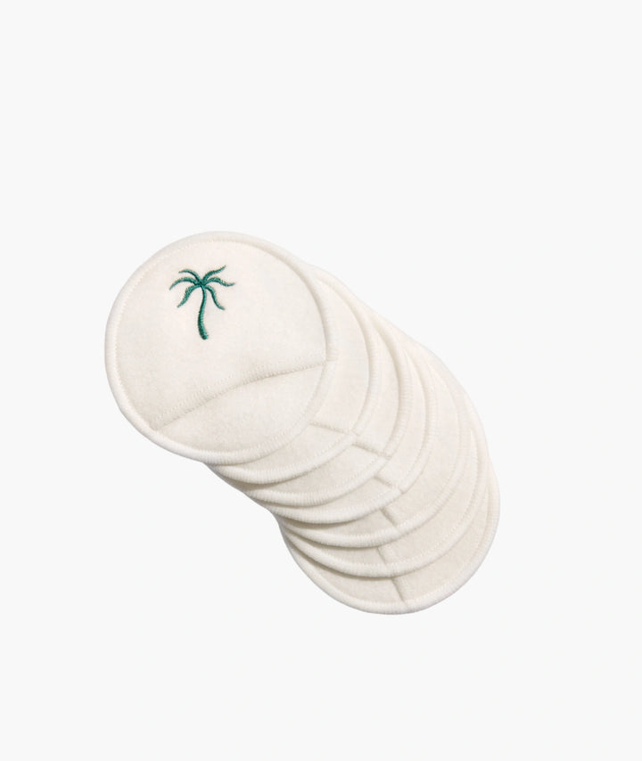 Reusable Cotton Rounds by Saya — stack of white makeup remover pads with green palm logo | eco-friendly cleansing