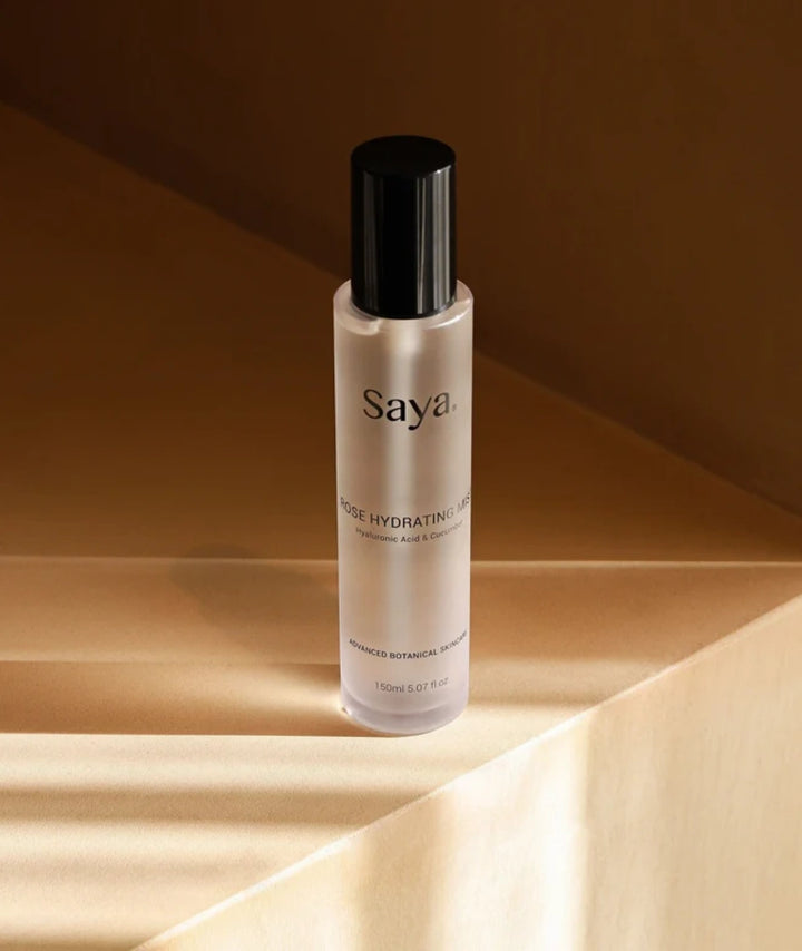 Saya Rose Hydrating Mist bottle featuring botanical skincare with hyaluronic acid and cucumber extract.