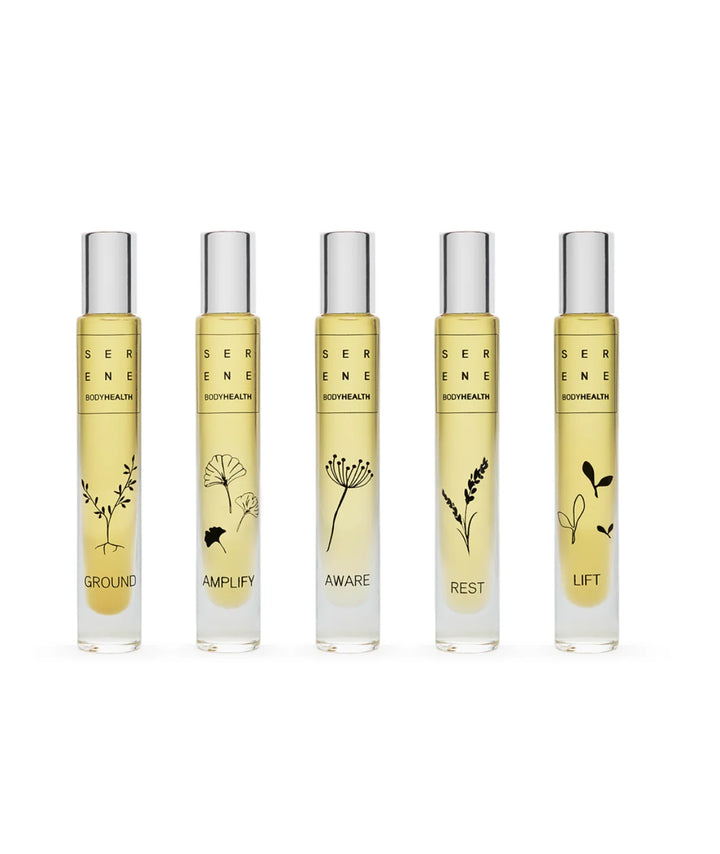 Lineup of Serene Bodyhealth essential oil perfume rollerballs: Ground, Amplify, Aware, Rest, and Lift.