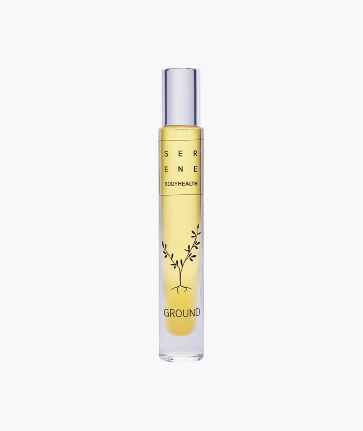 Ground Roll-On by Serene BodyHealth — slim glass rollerball bottle with rooted plant design | centering essential oil