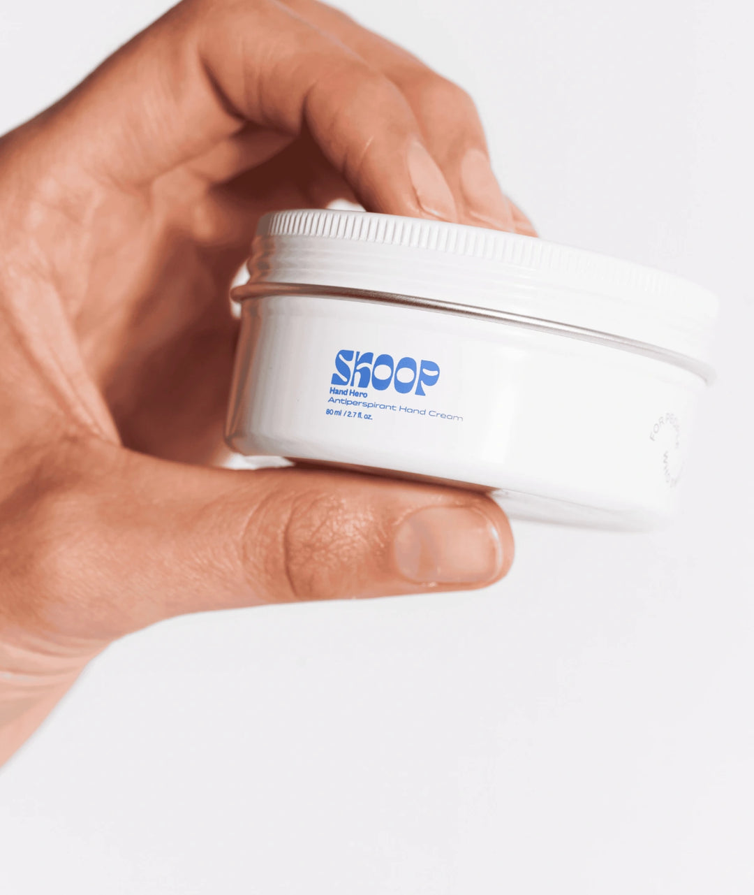 Hands using Skoop Hand Hero Antiperspirant Dry Touch Hand Cream, innovative sweat-absorbing hand cream designed for people experiencing sweaty palms, helping keep hands drier during work, sport and everyday activities.