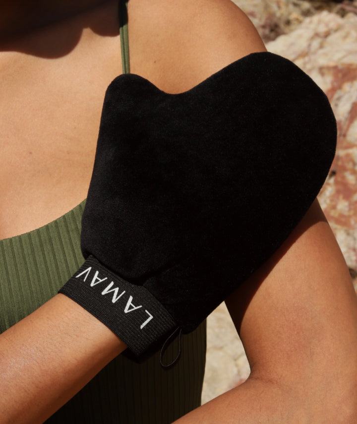 LAMAV velvet tanning mitt showing soft double-sided velour texture for even tan application