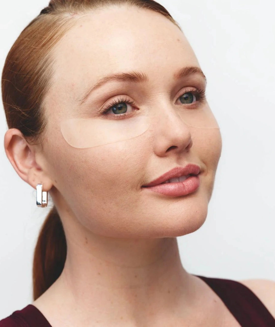 Applying Wrinkles Schminkles silicone patches under the eyes